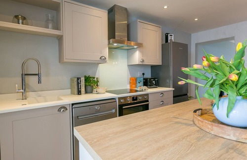 Bryngwran Cabaña | The Forge - cottage with hot tub hat sleeps 4 guests in 2 bedrooms
