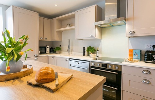 Bryngwran Cabaña | The Forge - cottage with hot tub hat sleeps 4 guests in 2 bedrooms