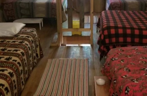 Boulder Junction Cabina | The Guest Cabin - Lakeside cabin with large screened in porch and fireplace