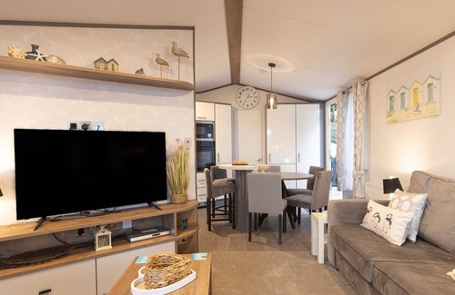 Mudeford Cabaña | The Harris Hut: una caravana de arenales con capacidad para 5 personas en 2 habitaciones