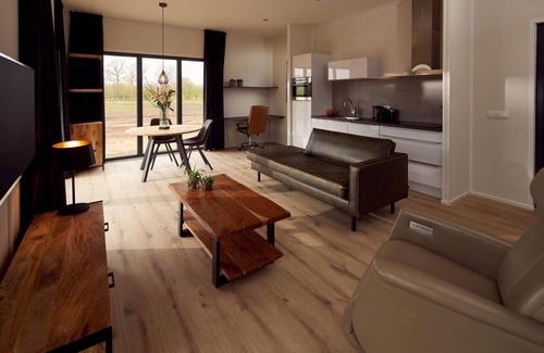 Kotten Casa | The holiday villa Amalia 2 is wheelchair friendly and has a cozy, spacious, and homely living room with an open kitchen, 1 bedroom, and a spacious outdoor area.