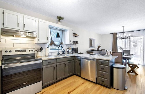Wichita Casa | The Lodge is a spacious 4 bed, 2.5 bath home, styled with mountain/ lodge decor