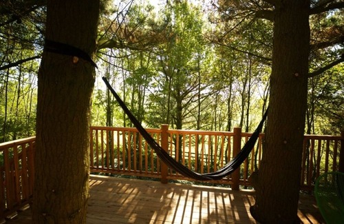 Putsborough Casa | The Loft at Pickwell Manor- A unique and wonderful treehouse with an ocean view