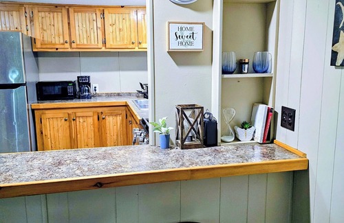 Luther Casa | The Northwoods Den- A terrific 2-bedroom house on 9 secluded acres in Luther MI