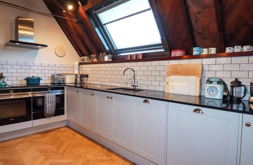 Crantock Cabaña | THE OLD VILLAGE CHAPEL, pet friendly, with open fire in Crantock