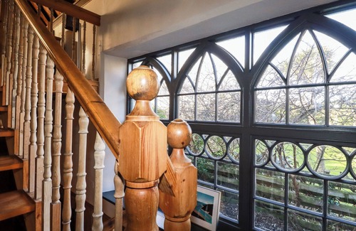 Crantock Cabaña | THE OLD VILLAGE CHAPEL, pet friendly, with open fire in Crantock