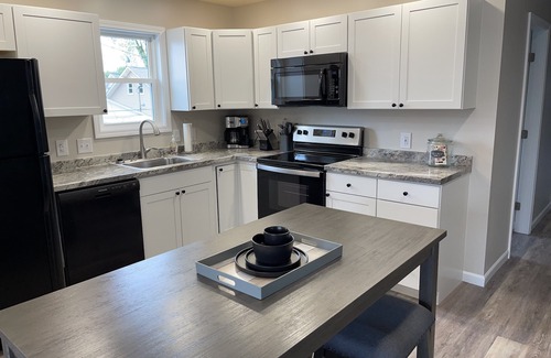 Russells Point Casa | The Peak of Indian Lake, Pickle Ball Court and Boat Dock!