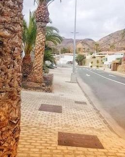 Mogan Apartamento | The perfect place to relax Bedroom with hot tub, beautiful tropical garden area. Bbq and big open spaces through all the house.It is located in a quiet place, but still 5 min away from the touristic Puerto Rico and walking distance from the beach