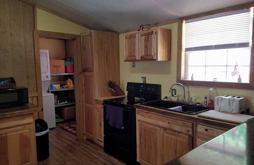Genoa Cabina | The Sandstone 3BR 2BA Ranch Style Log Cabin