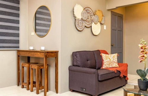 Piarco Condominio | The Retreat - Modern 1Bdr Condo 2 mins from Int. Airport