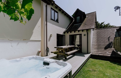 Croyde Cabaña | Amplia casa de vacaciones de 4 dormitorios en Croyde con bañera de hidromasaje