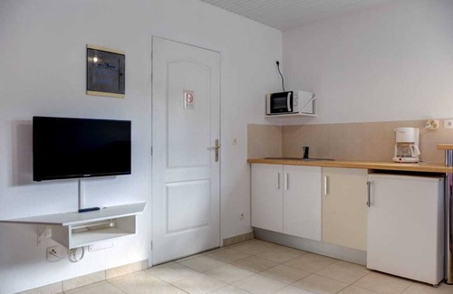 Tartane Apartamento | El Estudio Mahoganys frente a la península de Caravelle