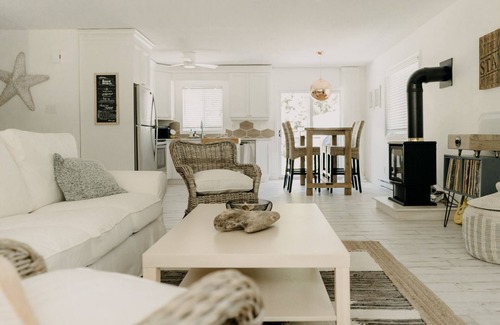 Bayfield Cabaña | The Sugar Shack family retreat w arcade & hot tub. Walk to Main St. and Beach