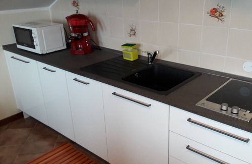 Madonna dell'Olmo Apartamento | El mundo en una habitación