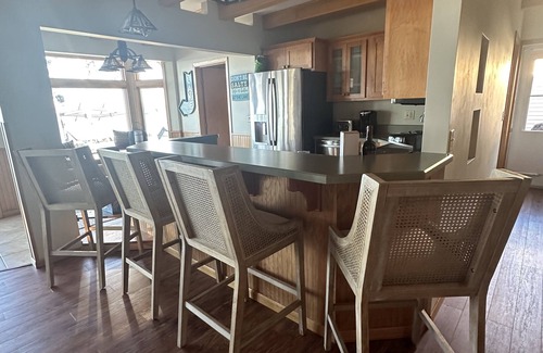 Spirit Lake Casa | The Yellow House on East Lake! Dock access to bring your boat.