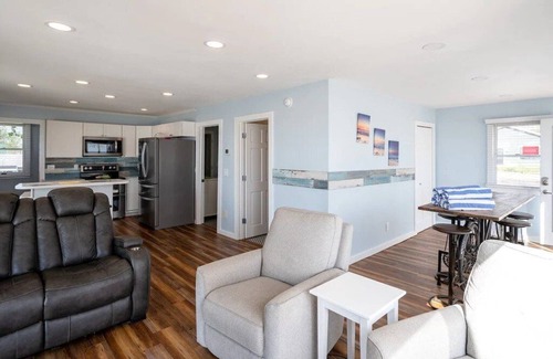 Mears Casa | This charming vacation home sits directly on Lake Michigan and it delivers!