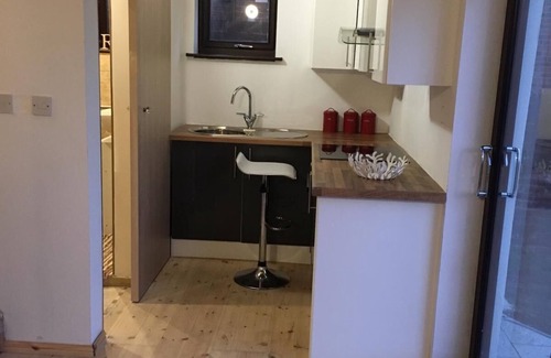 Gateshead Apartamento | Este es un apartamento de una habitación con garaje con cocina y wifi gratis