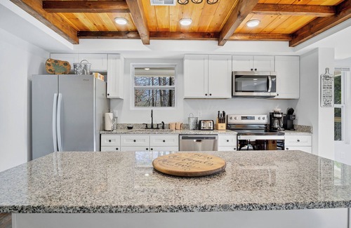 Townsend Casa | This newly built home has much to offer! hot-tub , fenced in back yard .