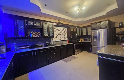 Claxton Bay Casa | This spacious property features a fully equipped kitchen, and an inviting small pool