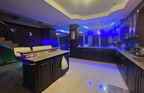 Claxton Bay Casa | This spacious property features a fully equipped kitchen, and an inviting small pool