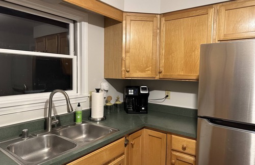 Nantucket Cabaña | This two-bedroom cottage features one queen bed, two twin beds, and a sofa bed.