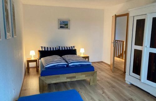 Tarp Casa | Thomsen - familienfreundliche Ferienwohnung mit großem Garten