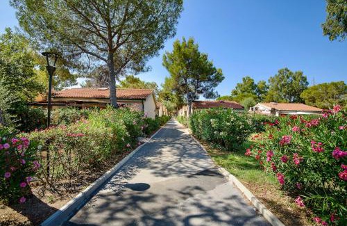 Piombino Apartamento | THR-ISA-Appartament plus with mezzanine, 4 beds, air conditioning and private outdoor area in Village with 6 swimming-pools