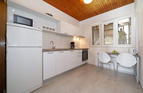 Brela Apartamento | Apartamento de tres habitaciones con terraza y vista al mar Brela, Makarska (A-19205-c)