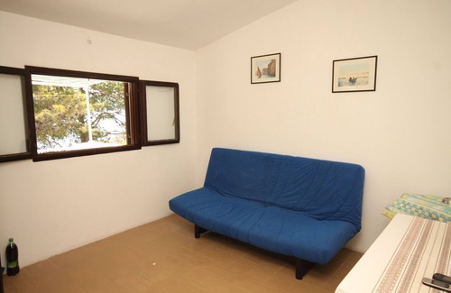 Island Dugi Otok Apartamento | Apartamento de tres habitaciones en la playa Lavdara, Dugi otok (A-3454-a)
