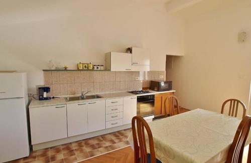 Supetarska Draga Apartamento | Three bedroom apartment with terrace and sea view Rab (A-24682-a)