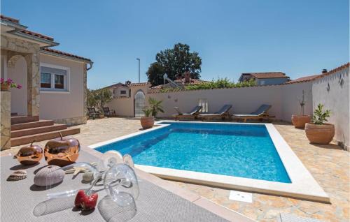 Barbariga Casa | Three-Bedroom Holiday Home Betiga With A Fireplace 02