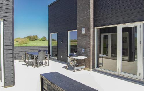 Nørre Lyngby Casa | Three-Bedroom Holiday Home Løkken With A Fireplace 07