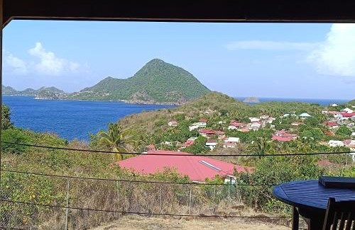 Grand Anse Casa | TI KAZ ANOLI Cottage en bois avec vue sur la baie