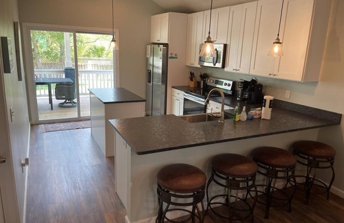 Butler Beach Casa | Tidal Paradise - Heated Pool & Firepit! Walk to the Beach!