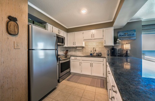 Ash Condominio | Tidemaster 601 - Oceanfront Corner Unit - Walk to Main Street