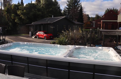 Ohakune Casa | Tiffany Resort complete with swim spa and outdoor kitchen