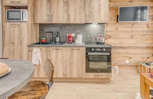 Le Lavachet Apartamento | Tignes: Impresionante Apartamento con Terraza, 2 Piezas, Servicios Hoteleros Incluidos