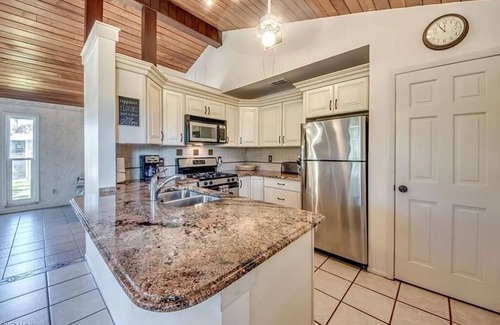 Alden Pines Casa | Tiki Garden Paradise Charming 4-bedroom Bokeelia House in the Sky on Island Time