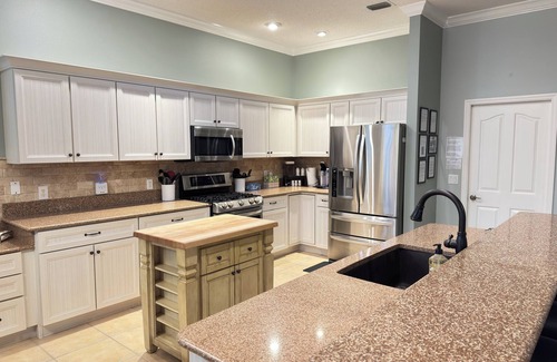Sunset Pointe Casa | TikiTiki Lake Sumter, private pool, hot tub, game room, outdoor kitchen&tiki bar
