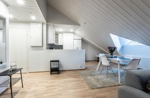 Downtown Kuopio Apartamento | Tilava kattohuoneisto ydinkeskustassa, edullinen parkkipaikka autolle lähellä