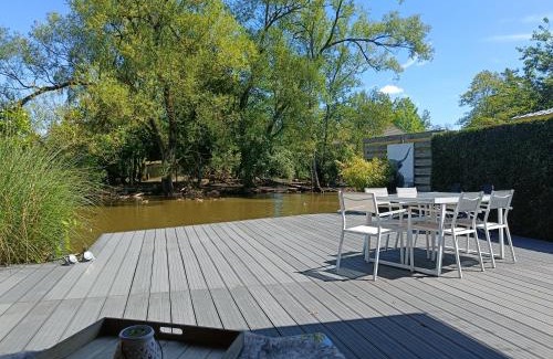 Geel Chalet De Esquí | Time 2 Relax chalet aan het water