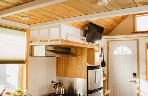 Meeker Casa | Tiny Home built by Rocky Mountain Tiny Homes in Durango, Colorado. It contains a Queen bed in a loft with stairs. Sleeps: 2 Pets: Max 2 Please note, this home does have a sleeping area in a loft. If you require an accommodation with more accessibilit