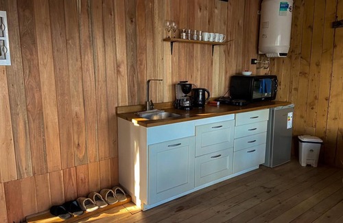Barrio Península San Pedro Cabina | Tiny house meters away from lake nahuel huapi. Access to the beach from the house.