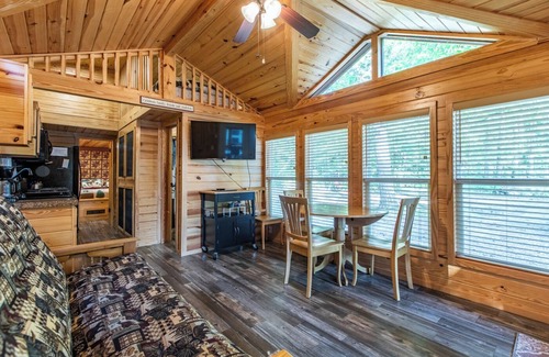 Nevis Casa | Tiny house nestled in the woods with lake view. Pets Accepted!
