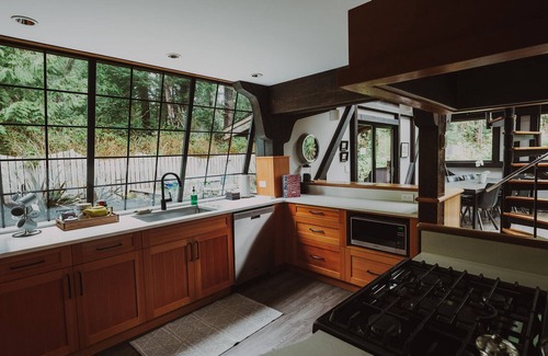 Tofino Casa | Tofino Brick House — architecturally unique home and gardens at Chesterman Beach
