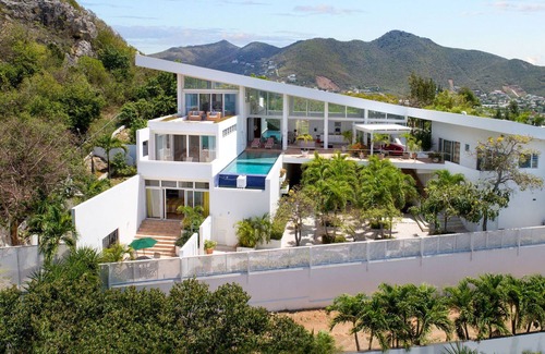 Pelican Key Apartamento | Parte superior de Pelican Key! Espectaculares vistas al mar, cerca de playas, wifi, estacionamiento, privado