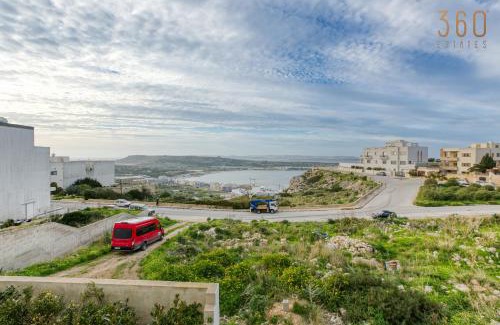Mellieħa Heights Apartamento | Top of the world 2BR home with spectacular views by 360 Estates