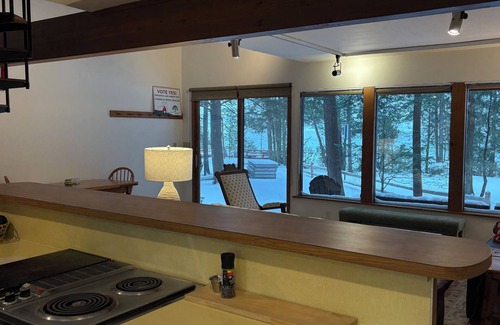 Alden Cabaña | Torch lake waterfront:100 ft of sandy beach, 3-bedroom, 3-bath cottage