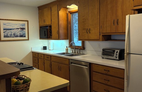 Alden Cabaña | Torch lake waterfront:100 ft of sandy beach, 3-bedroom, 3-bath cottage