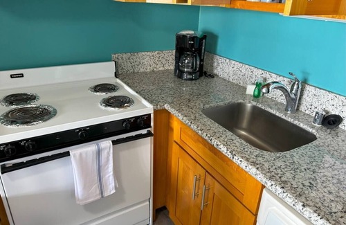 McCully - Moiliili Condominio | Total of 2 bedrooms at Royal Kuhio, Sleeps 8, with AC. Two units, same floor,
